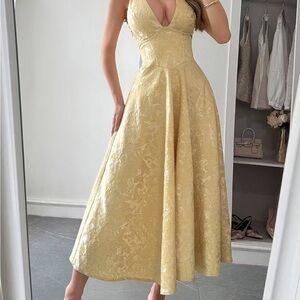 Elegant Yellow Brocade V-Neck Midi Dress